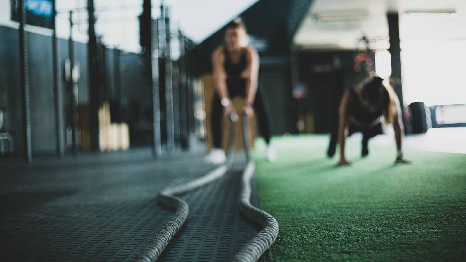 two person inside gym exercising