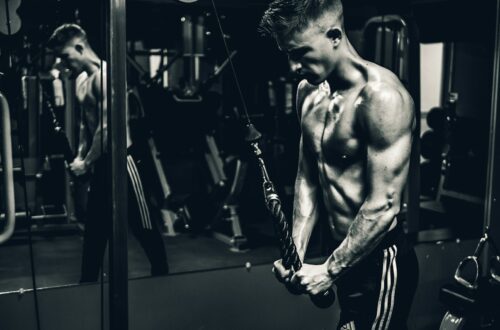 grayscale photo of man exercising
